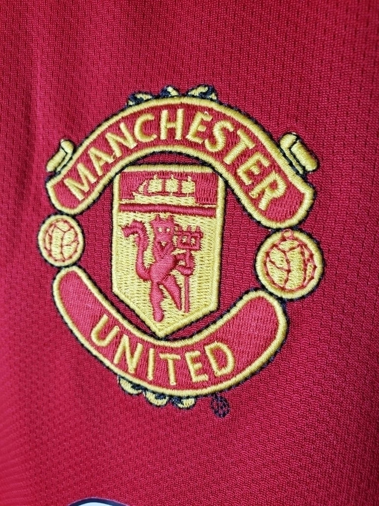 Camisa Retrô Manchester United I 2005 - Masculina - Vermelha com detalhes em preto e branco