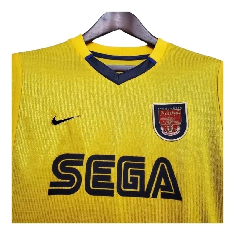 Arsenal II 99/00 - Masculina Nike - Amarela com detalhes em azul Camisa Retrô Arsenal II 99/00 - Masculina - Amarela com detalhes em azul