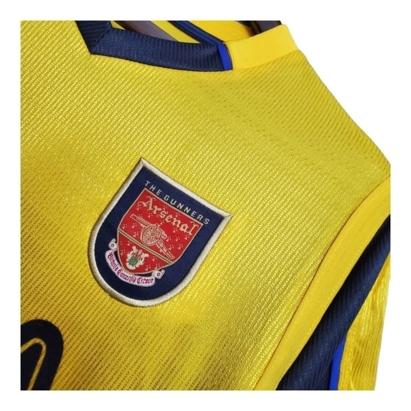 Arsenal II 99/00 - Masculina Nike - Amarela com detalhes em azul Camisa Retrô Arsenal II 99/00 - Masculina - Amarela com detalhes em azul