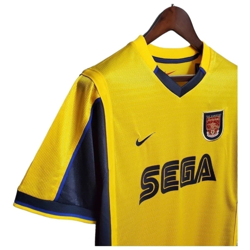 Arsenal II 99/00 - Masculina Nike - Amarela com detalhes em azul Camisa Retrô Arsenal II 99/00 - Masculina - Amarela com detalhes em azul